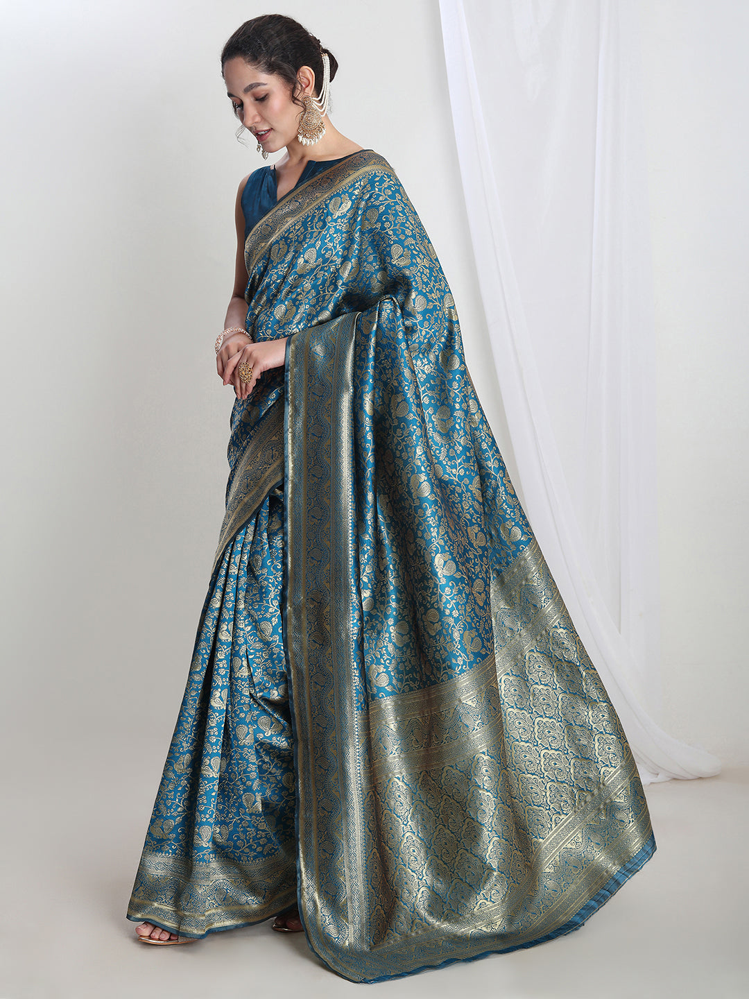 Janasya Teal Blue Silk Blend Floral Jacquard Saree