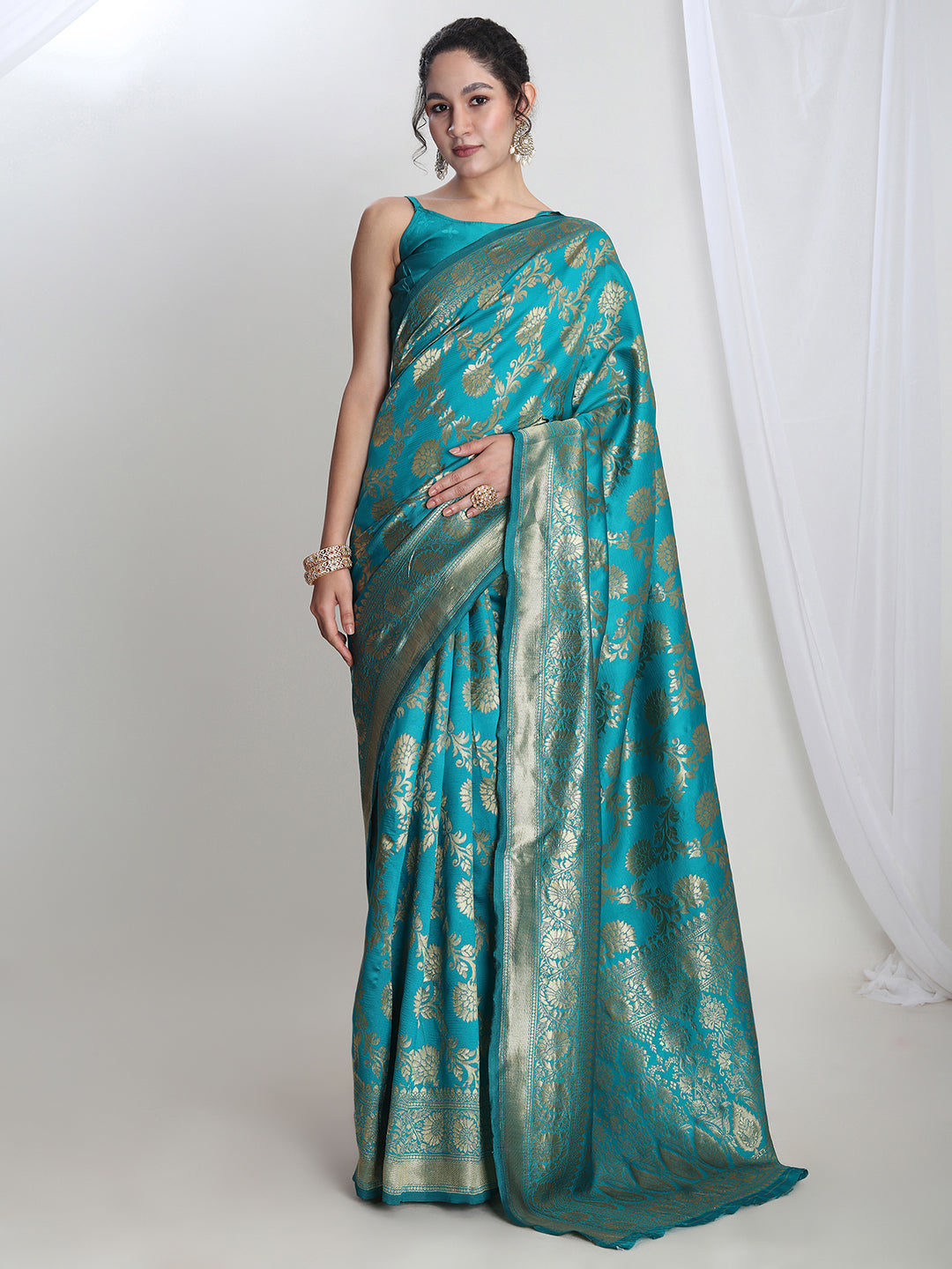 Janasya Teal Blue Silk Blend Floral Jacquard Saree