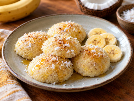 Steamed banana, coconut and semolina cakes on a plate