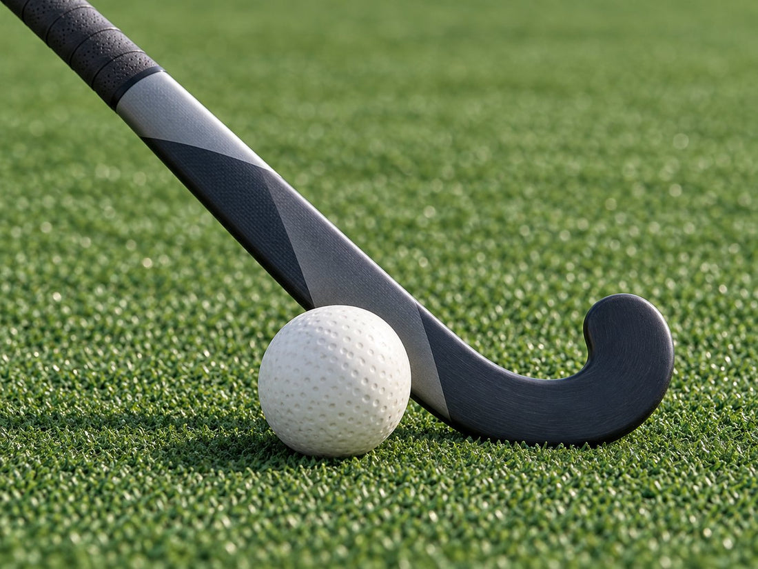Field hockey stick and ball on green turf, generated illustration