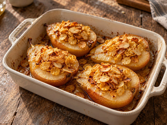 Four halved baked ripe pears with small heaps of golden cornflakes and toasted flaked almonds in honey, in a plain baking dish, no cream or ice cream, generated illustration
