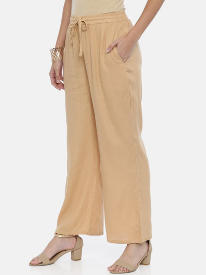 Souchii Beige Solid Flared Palazzos