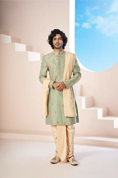 Majestic Mint Green Dupion Silk Sherwani With Satin Dhoti & Santone Dupatta by Hilo Design