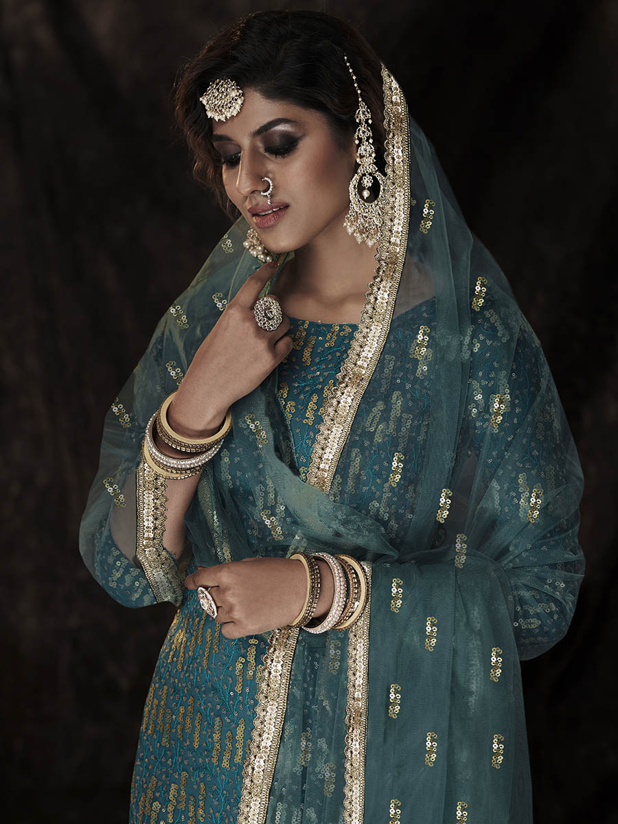 Myra Dark Firozi Net Embroidered Sharara Suit