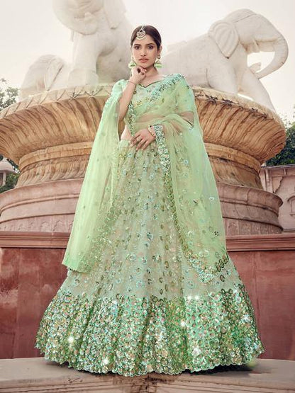 Myra Pista Green Soft Net Heavy Embroidered Lehenga