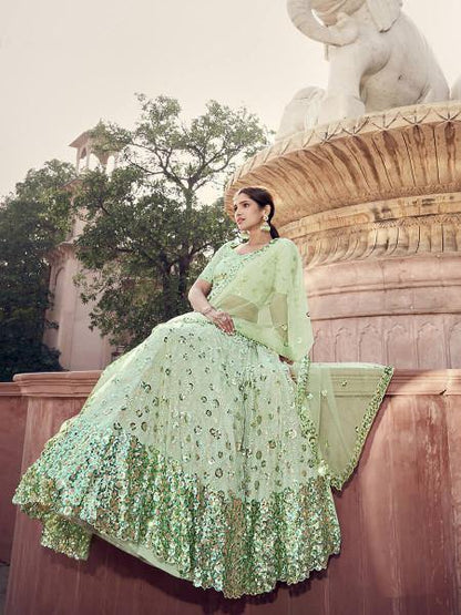 Myra Pista Green Soft Net Heavy Embroidered Lehenga