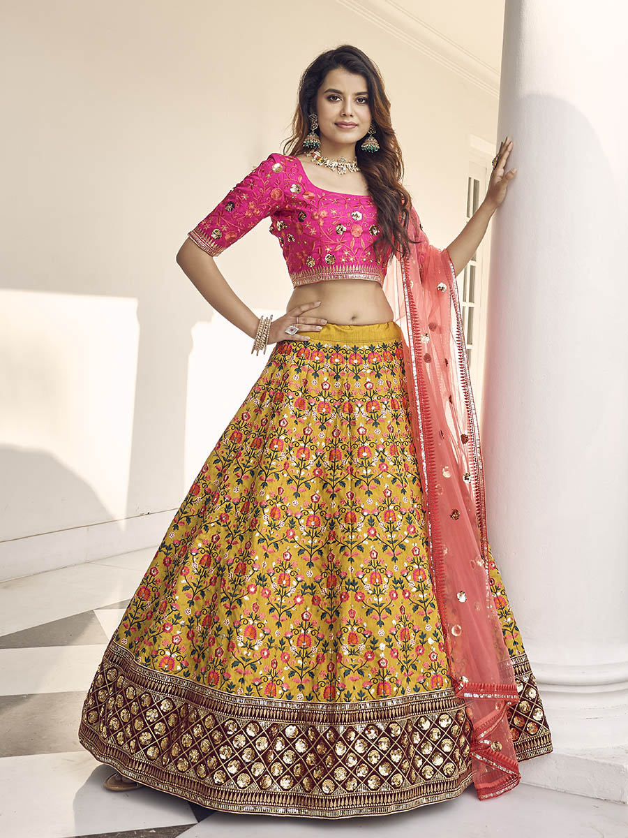Myra Mustard Yellow and Rani Pink Art Silk Heavy Embroidered Lehenga