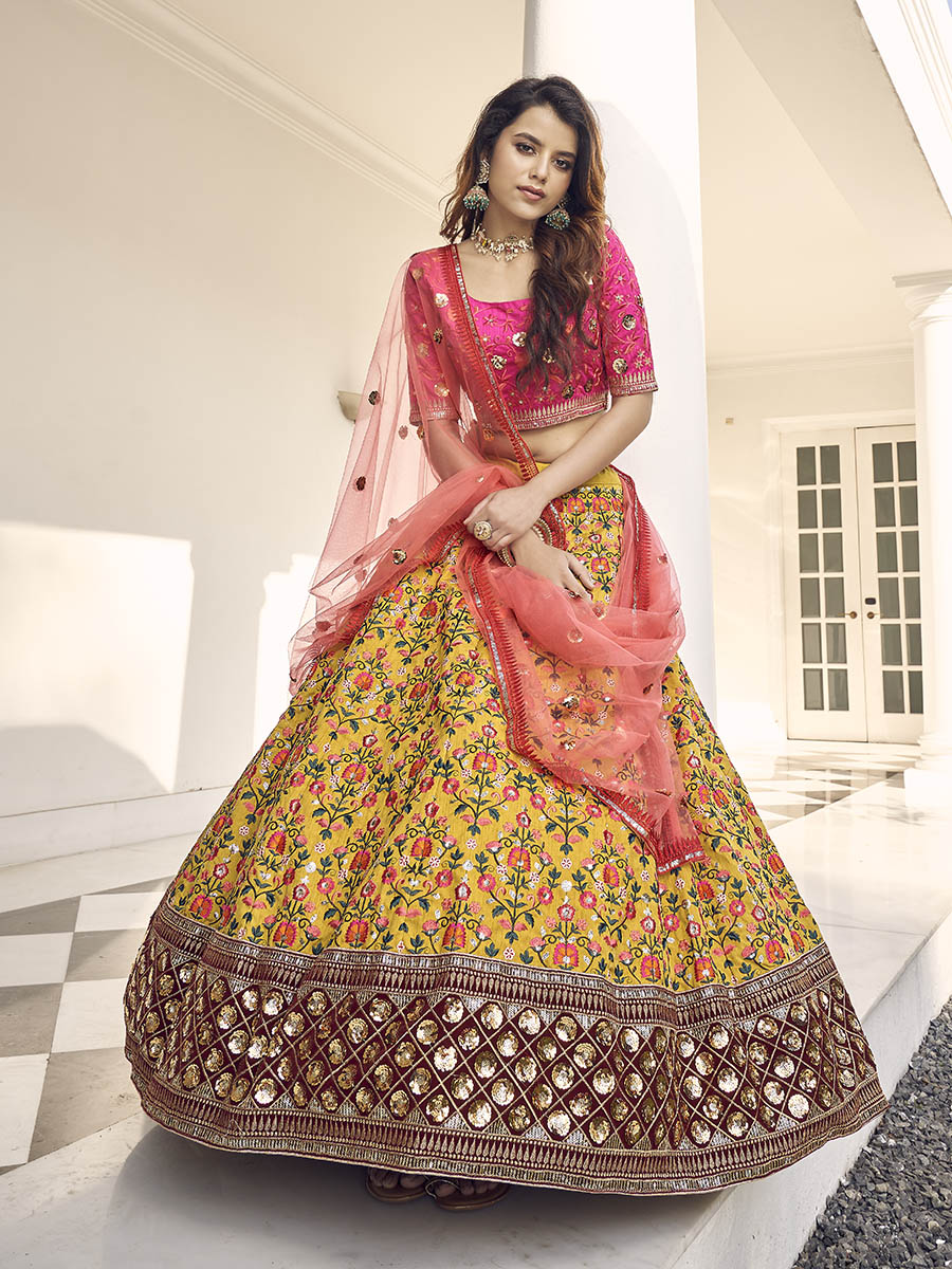 Myra Mustard Yellow and Rani Pink Art Silk Heavy Embroidered Lehenga