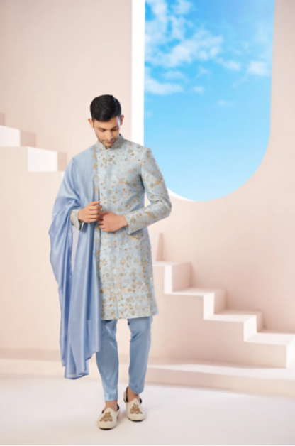 Majestic Blue Sherwani With Intricate Gold Crane And Floral Hand Embroidery. by Hilo Design
