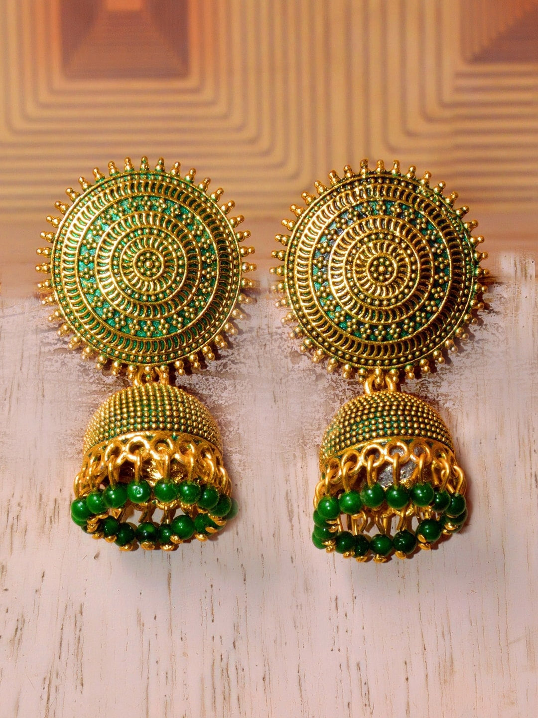 Gold-Polished Alloy Designer Brass Jhumki Earrings - The Pari