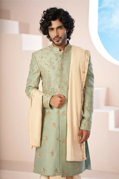 Majestic Mint Green Dupion Silk Sherwani With Satin Dhoti & Santone Dupatta by Hilo Design