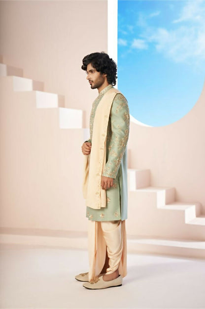 Majestic Mint Green Dupion Silk Sherwani With Satin Dhoti & Santone Dupatta by Hilo Design