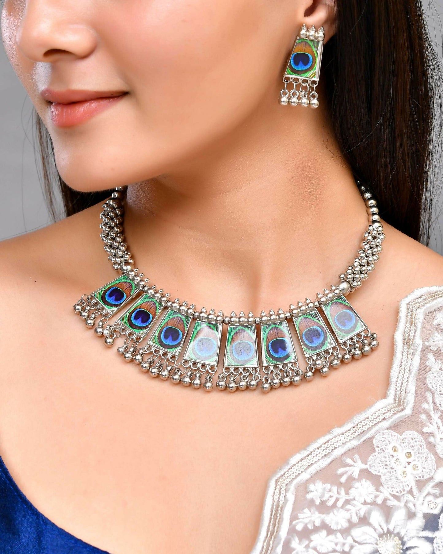 VOJ Silver Plated Oxidized Peacock Print Hasli with Earring Set