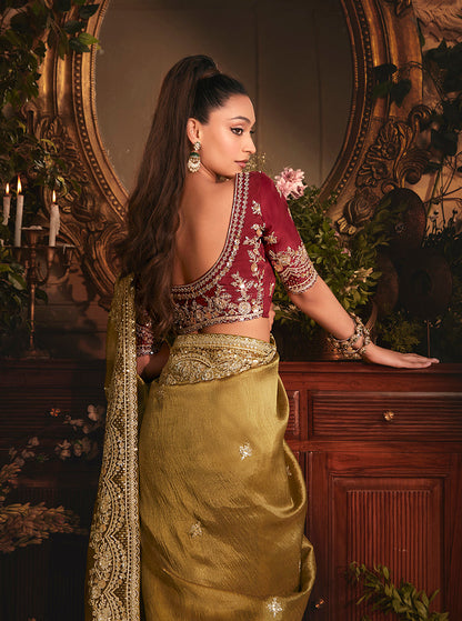 Monjolika Fashion Designer Golden Tissue Organza Saree With All Over Butta Work & Heavy Stone Embellished Border