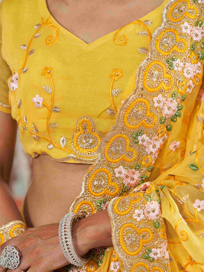 Tikhi Imli Yellow Ethnic Motifs Beads and Stones Embroidered Saree