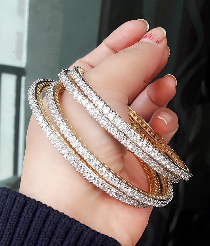 Gold-Polished Alloy American Diamond Studded Set Of 4 Bangles - The Pari