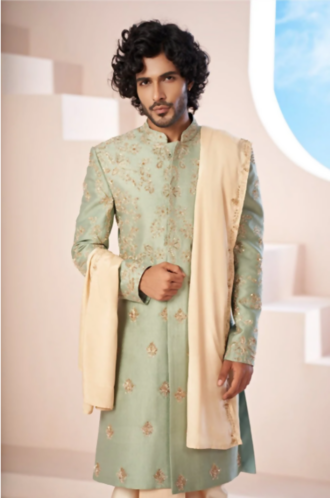 Majestic Mint Green Dupion Silk Sherwani With Satin Dhoti & Santone Dupatta by Hilo Design
