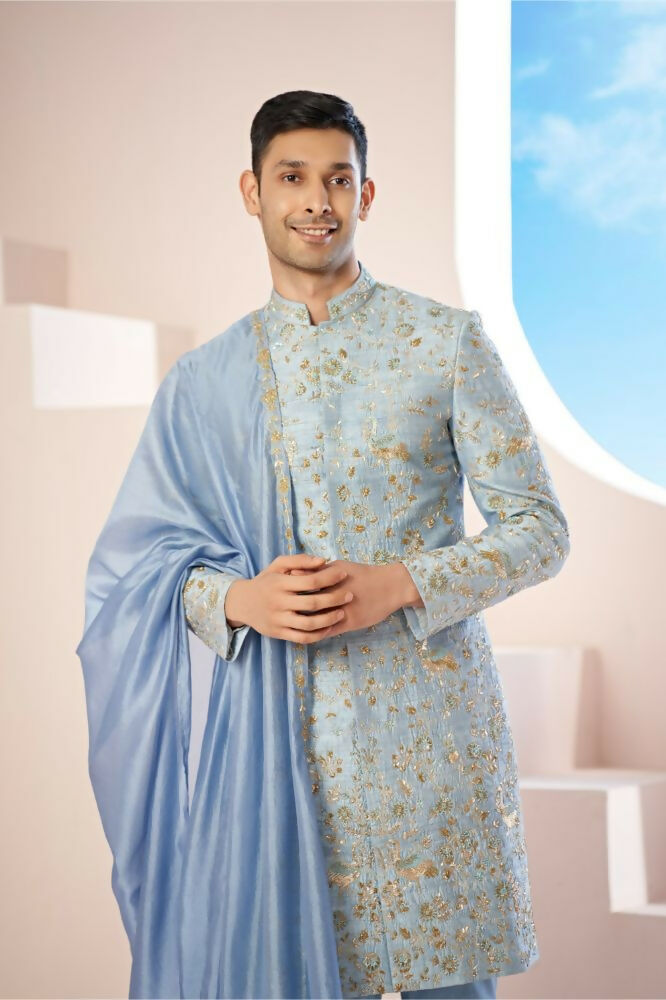 Majestic Blue Sherwani With Intricate Gold Crane And Floral Hand Embroidery. by Hilo Design