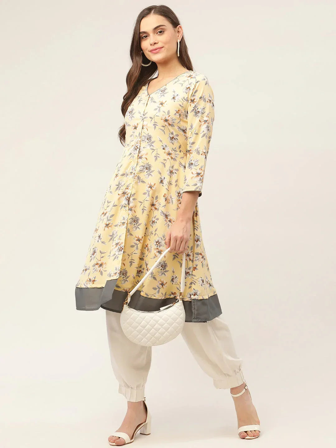 Jompers Women's Yellow and White Flared Printed kurta