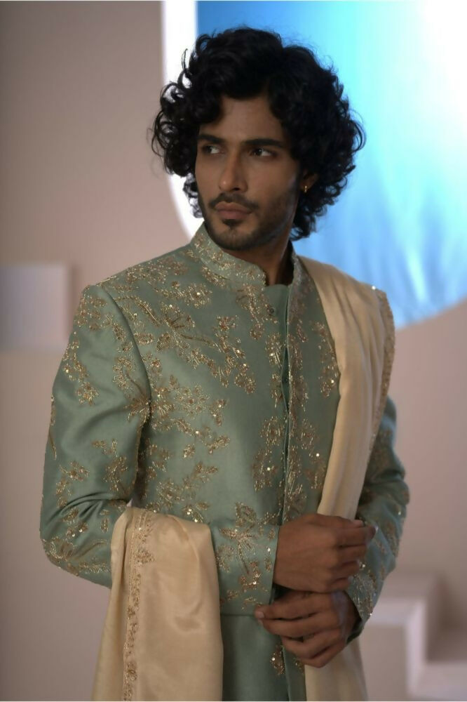 Majestic Mint Green Dupion Silk Sherwani With Satin Dhoti & Santone Dupatta by Hilo Design