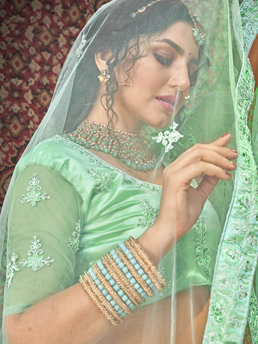 Myra Sea Green Heavy Embroidered Net Lehenga