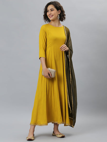 Janasya Women's Mustard Rayon Solid Flared Casual Kurta Set