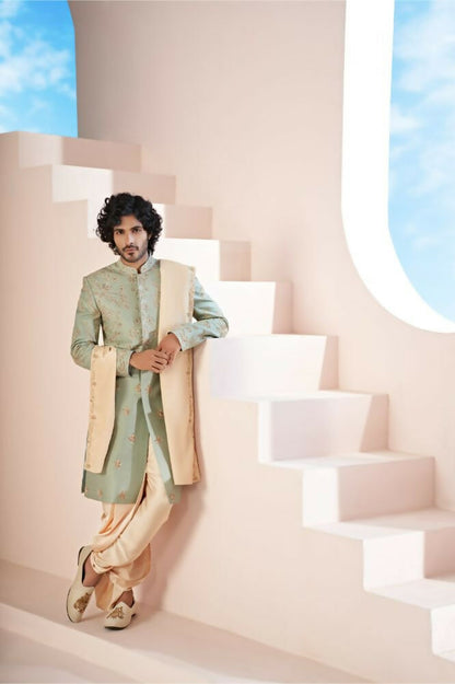 Majestic Mint Green Dupion Silk Sherwani With Satin Dhoti & Santone Dupatta by Hilo Design