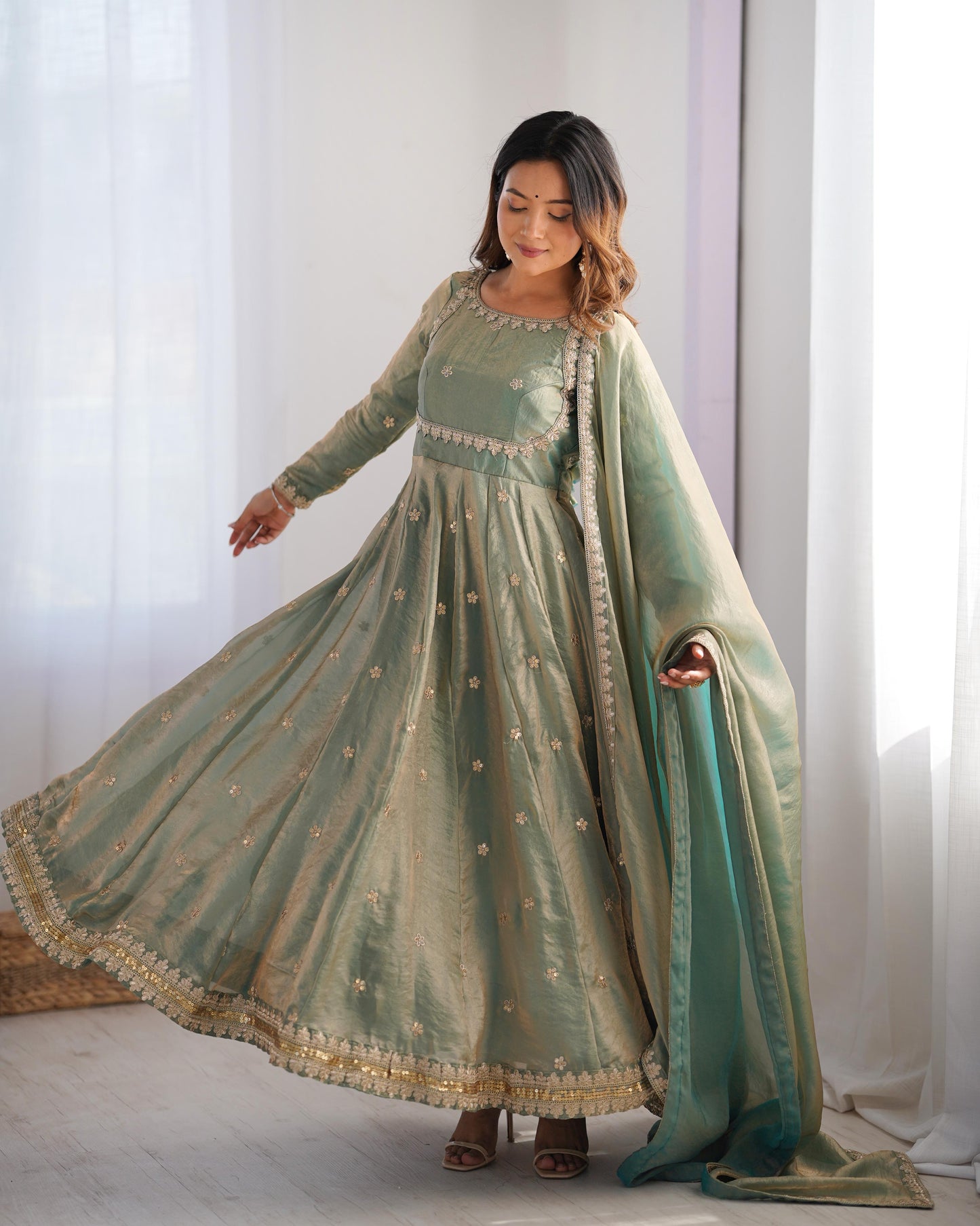 Teeya Creation Mint Green Color Fendy Silk Embroidery Work Fully Stitched Gown