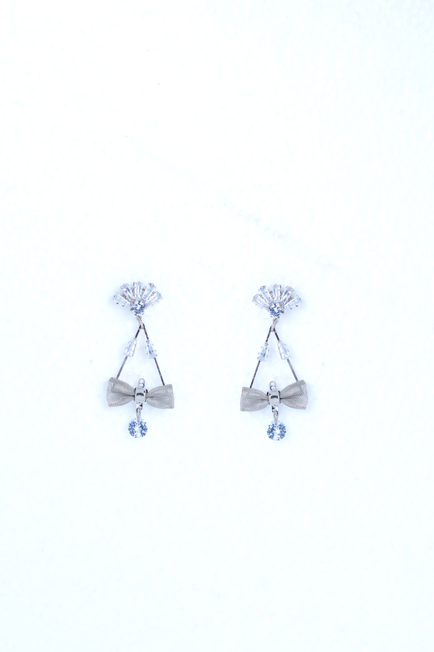 VOJ Silver Plated Stone Studded With Bow Triangle Shaped Earrings