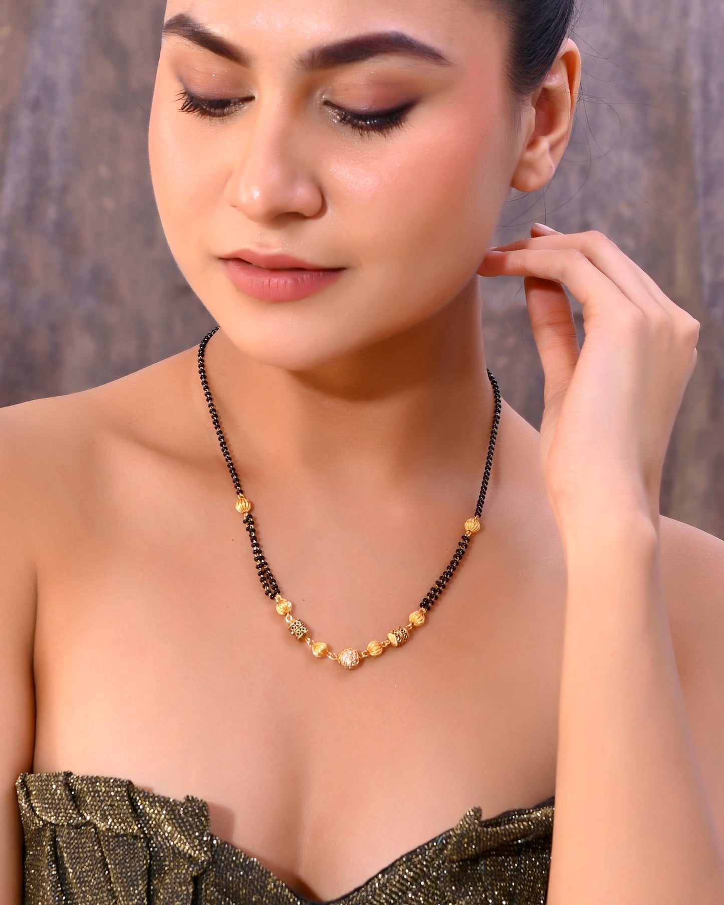 VOJ Gold-Polished Stone Studded Cricular shaped Mangalsutra