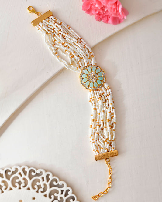 VOJ Gold-Polished Green Flower Studded And Beaded Mutli Layer Bracelet