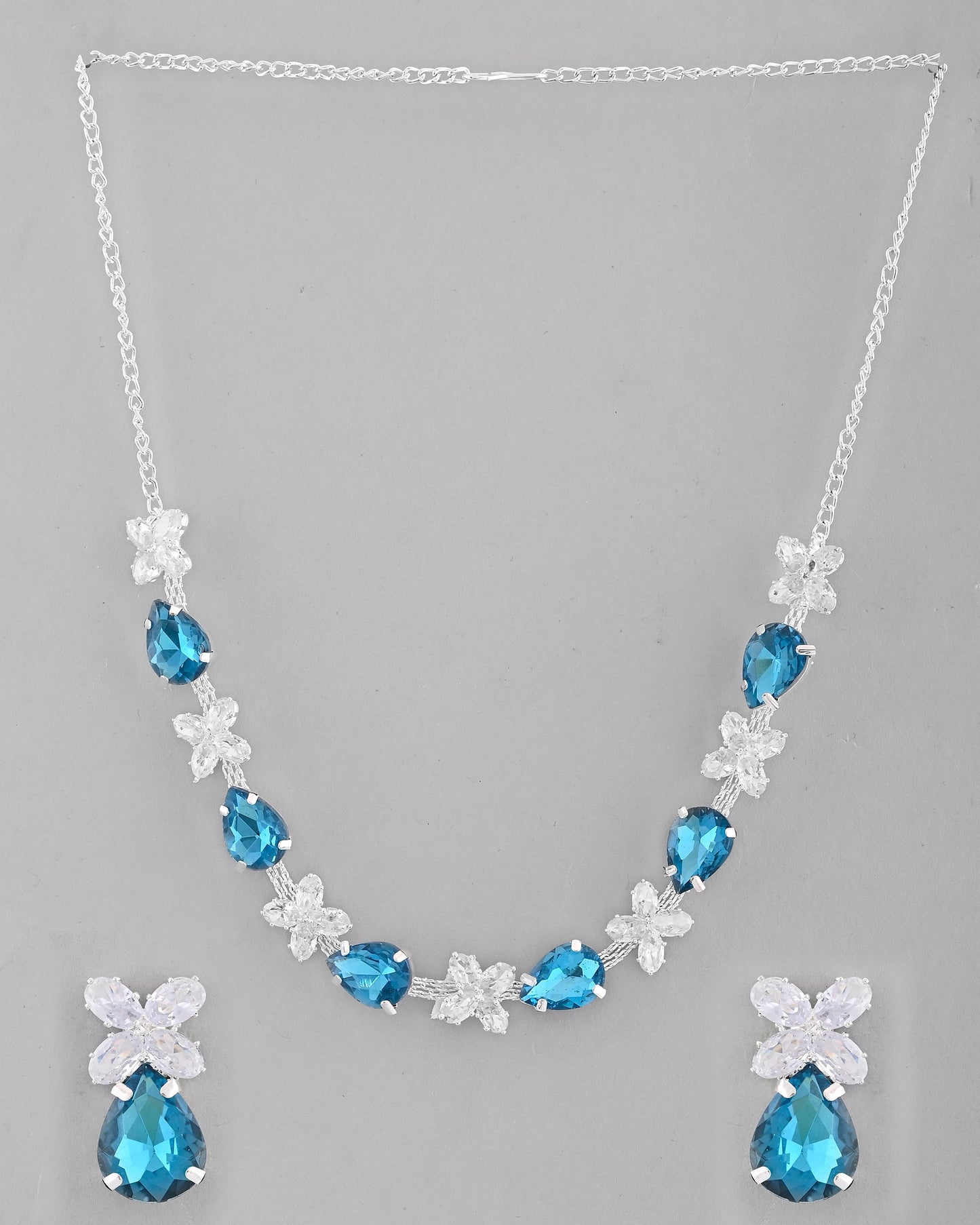 VOJ Silver Plated Blue And White Stone Studded Necklace with Earrings Set