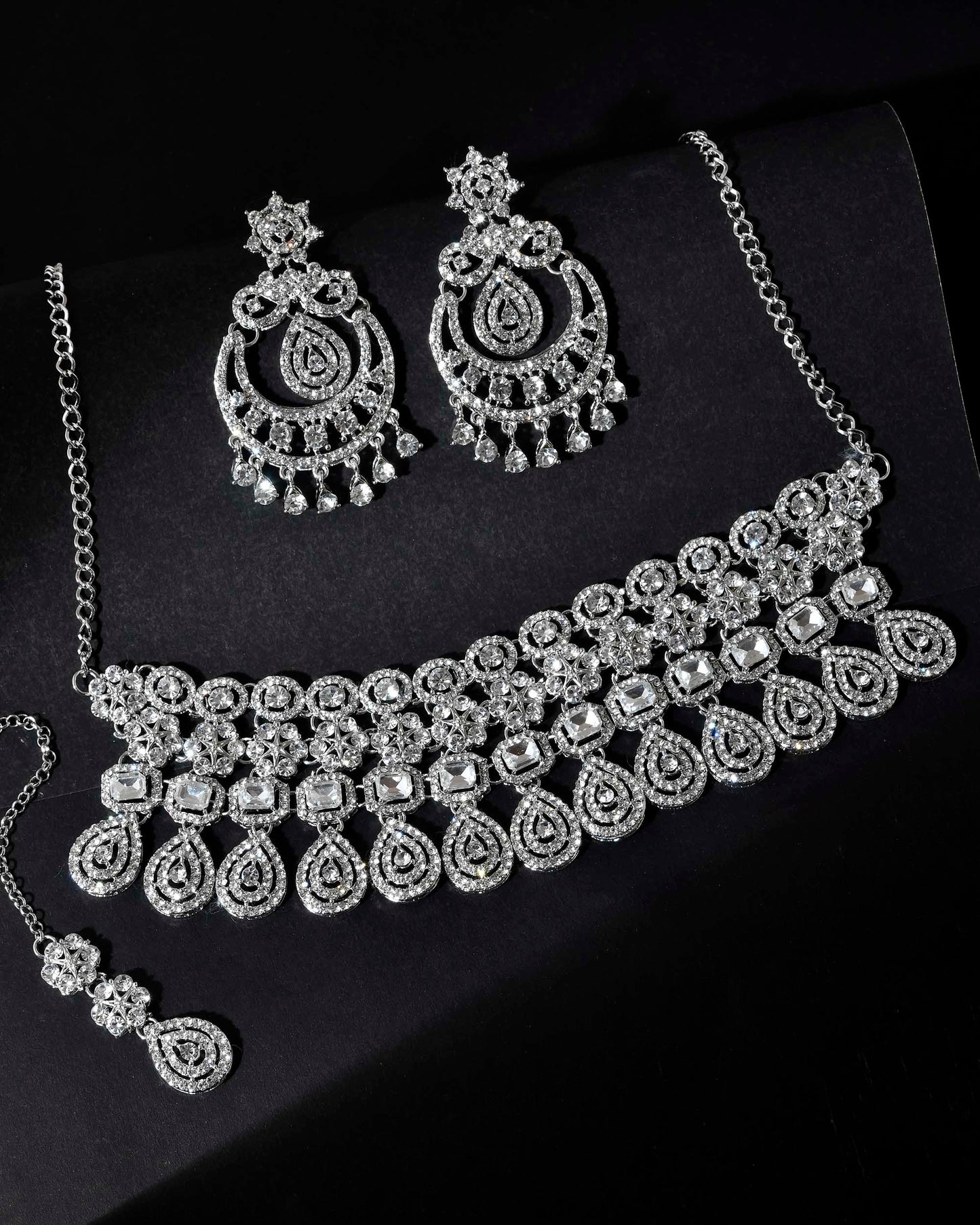 VOJ Silver Plated AD Studded Necklace With Earrings And Mangtikka Set