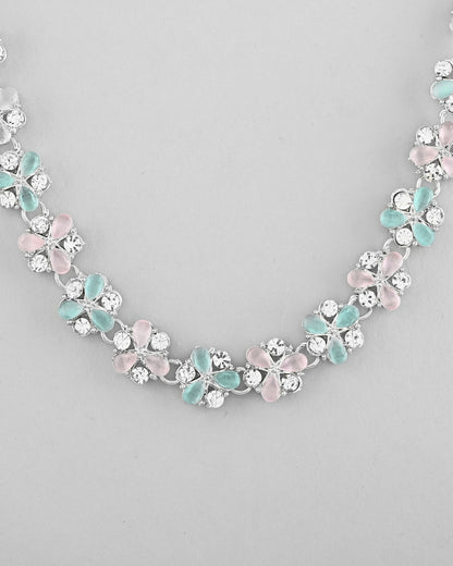 VOJ Silver Plated AD With Nude Green And Light Pink Flower Jewellery Set With Mangtikka