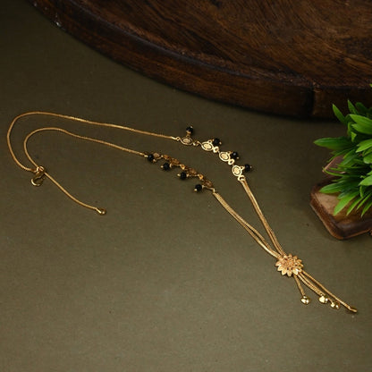 AanyaCentric Gold-Polished Jewelry Combo: Elegant Short Mangalsutra, Finger Ring, and American Diamond Earrings Set