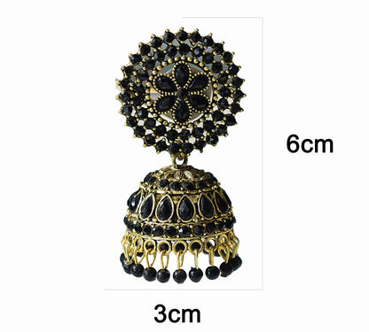 Gold-Polished Alloy Black Rhinestones Studded Jhumki Earrings - The Pari