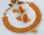 Designer Metallic Necklace Set With White Beads